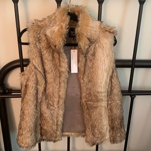 BRAND NEW! Never worn. Vici Vest.